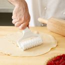 Rolling pin for cutting dough
