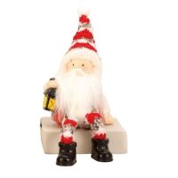 Santa figure with a woven cap