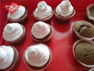 Gluten-free and dairy-free cupcakes with cherry and raspberry whipped cream