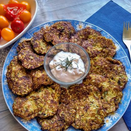 Gluten-free zucchini pancakes with bacon and smoked cheese