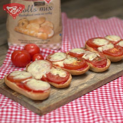 Gluten-free baked baguettes with tomatoes and mozzarella